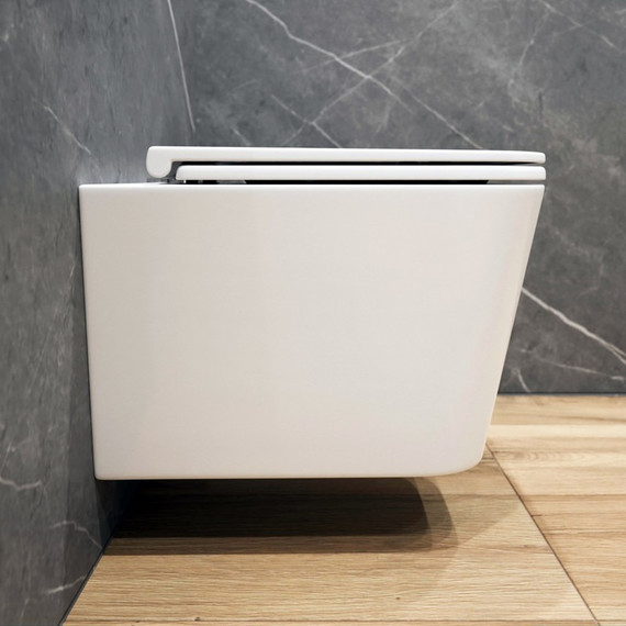 Унитаз подвесной безободковый EvaGold EG070043 с тонкой крышкой микролифт - фото, картинка 6 Унитаз подвесной безободковый EvaGold EG070043 с тонкой крышкой микролифт - фото 6